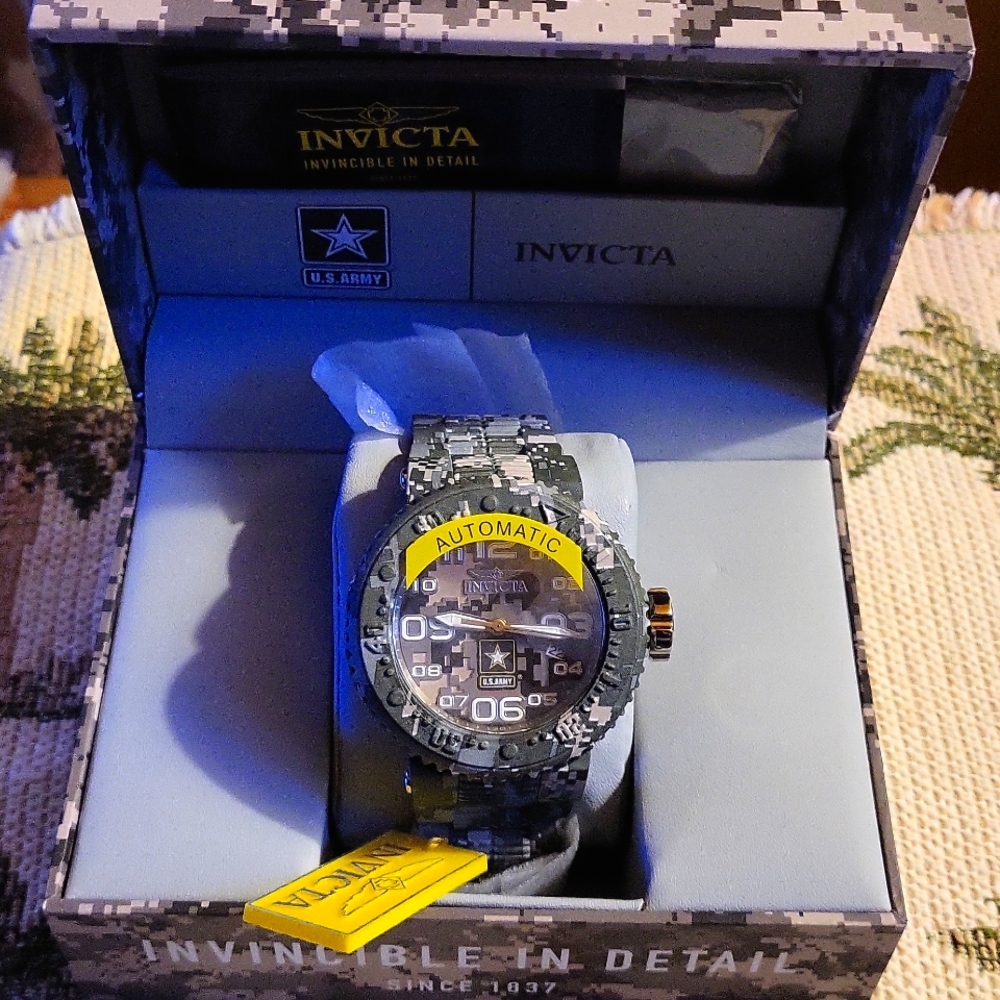 Invicta men's 52 mm this is a New one